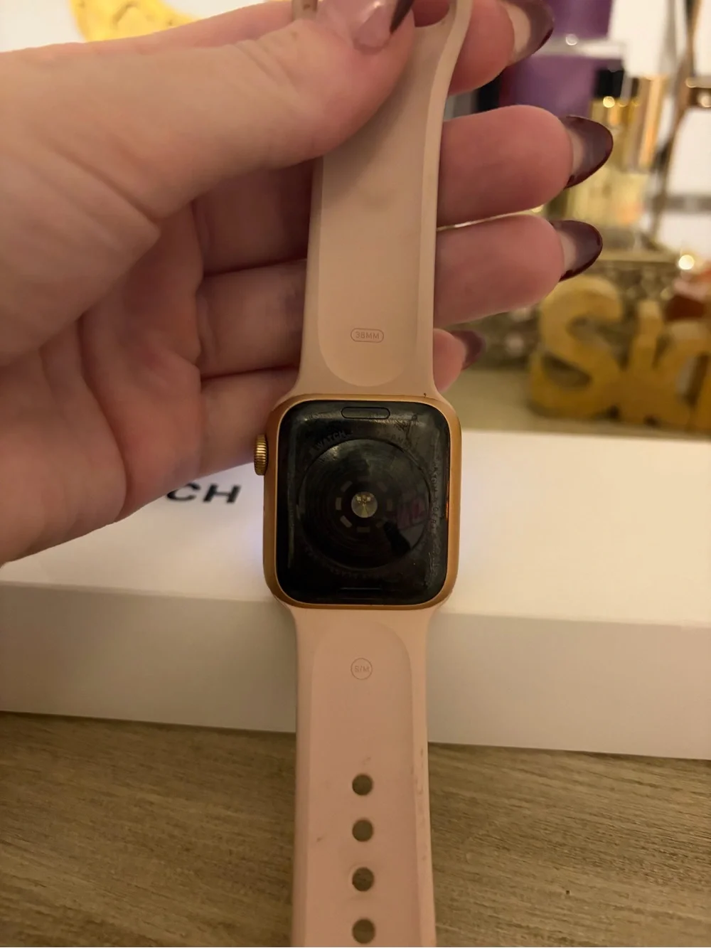 Apple Watch with Pink Sport Band and Multiple Additional Bands